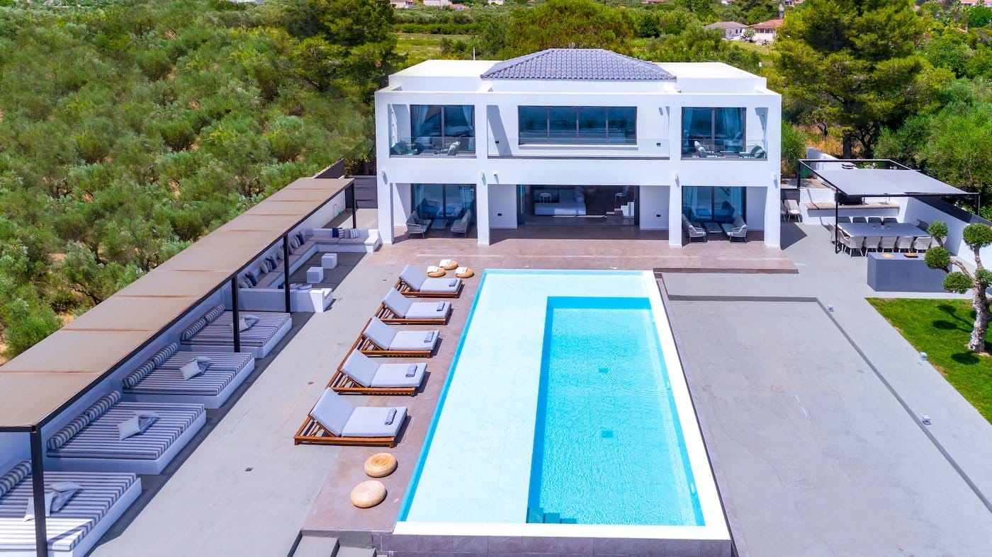 Divine Villa pool terrace, daybeds and outdoor lounge
